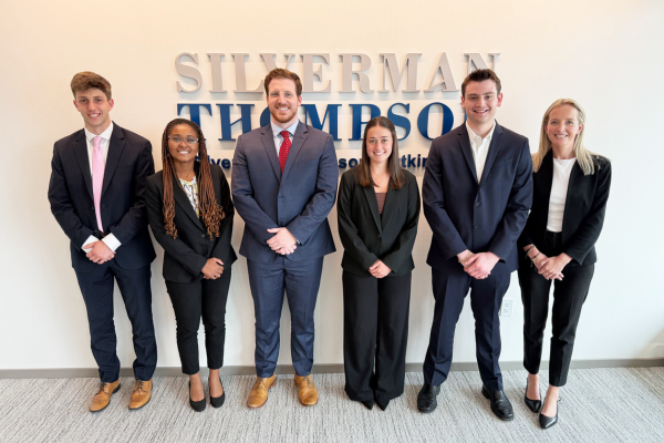 The firm's six summer law clerks